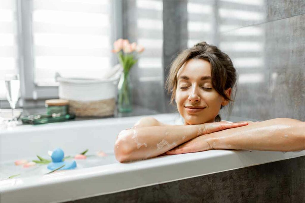 A woman relaxing in a bath